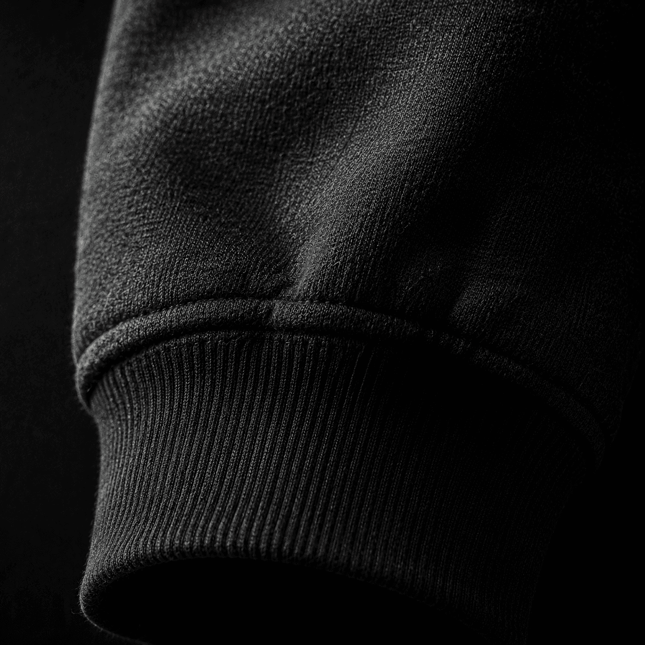 Close detail on heavyweight cotton hoodie construction