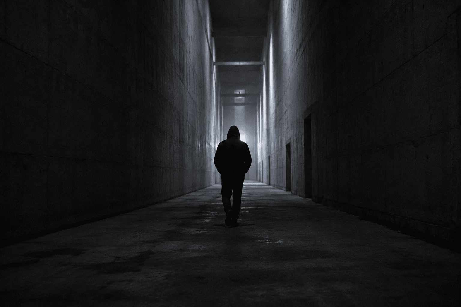Figure in motion under directional light — accessibility page backdrop